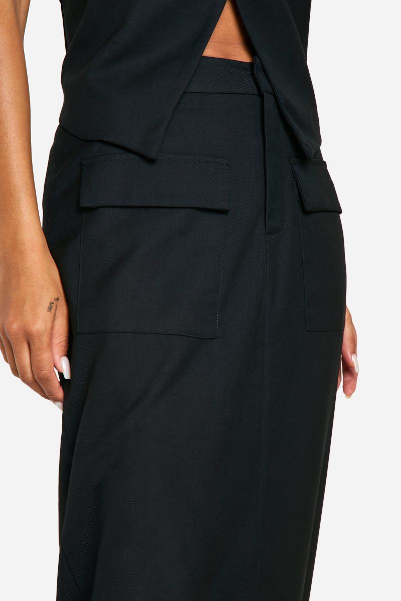 Плетена максі-спідниця з кишенями