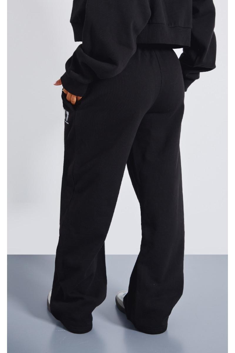 Маленькі преміум -чорні друковані прямі ноги пробіжки