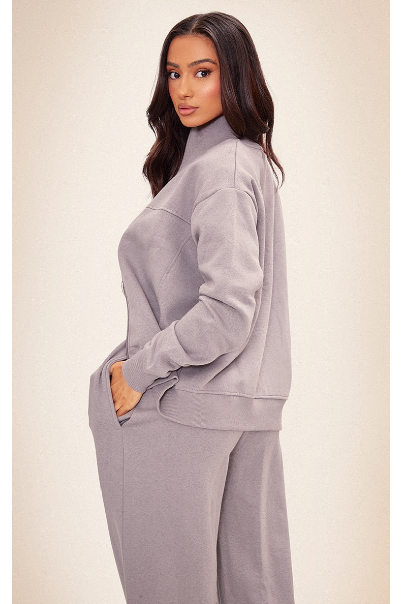 Маленький вугільно-сірий трековий топ із деталями на блискавці