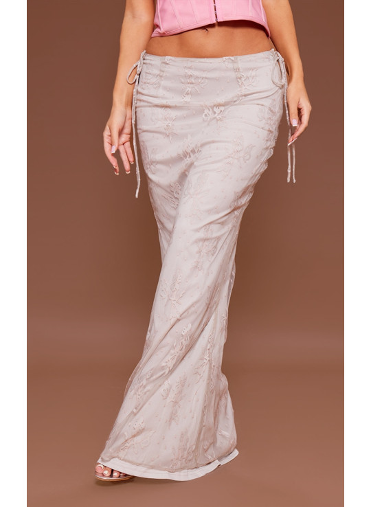 Кремова сітчаста максі-спідниця з низькою посадкою на зав'язках збоку з квітковою підкладкою