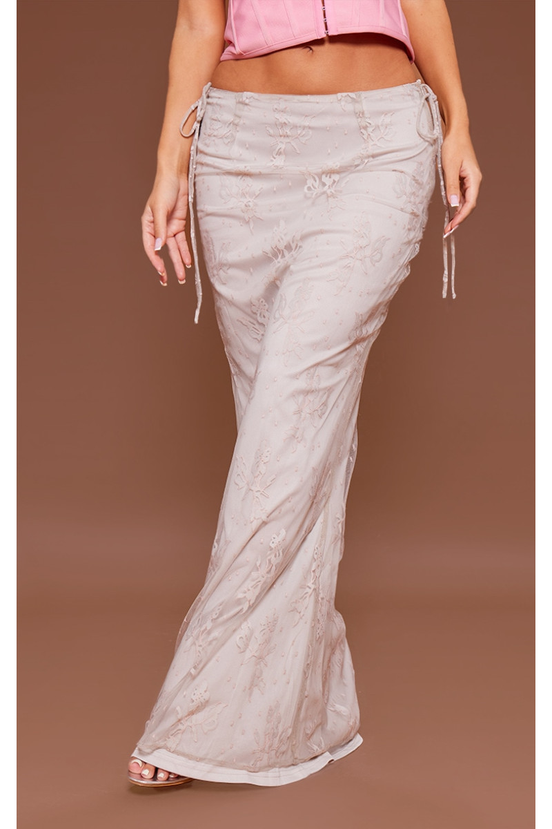 Кремова сітчаста максі-спідниця з низькою посадкою на зав'язках збоку з квітковою підкладкою