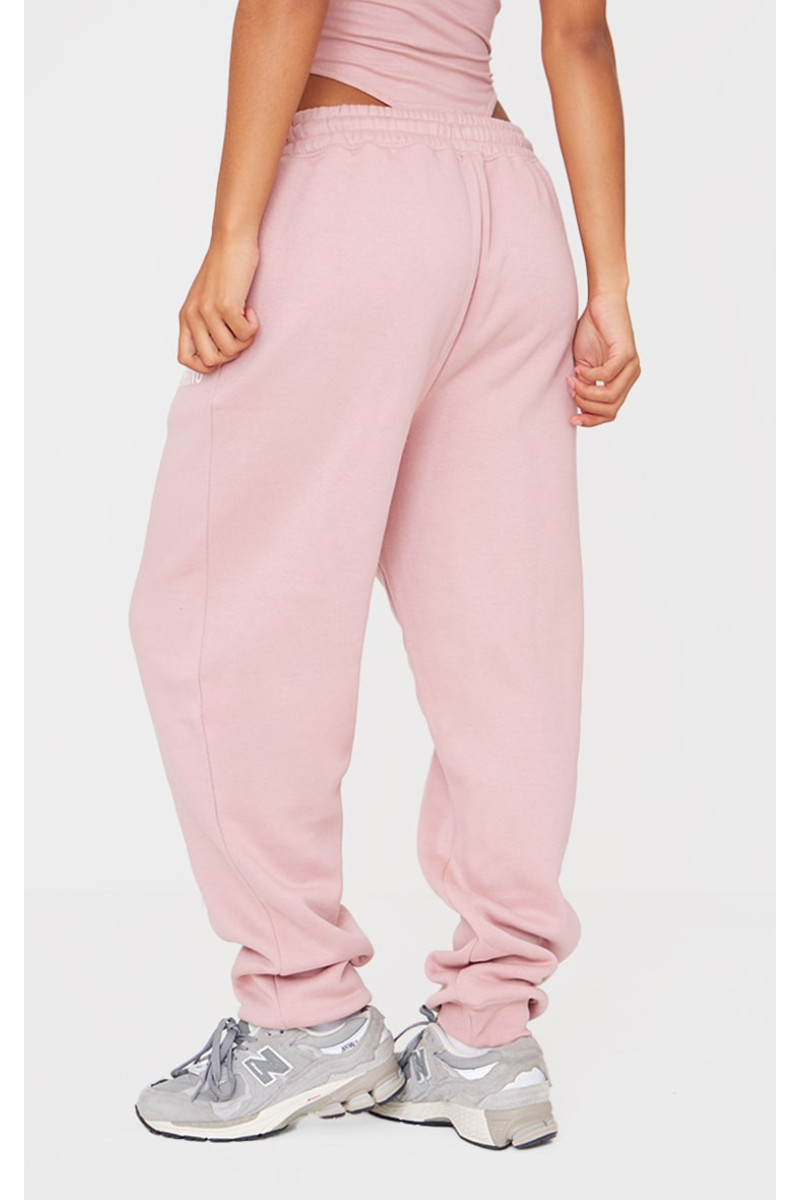 Світло-рожеві спортивні штани з манжетами PRETTYLITTLETHING