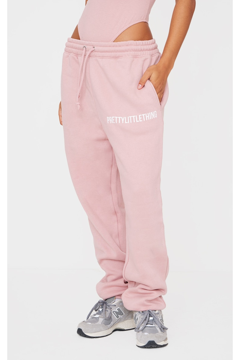 Світло-рожеві спортивні штани з манжетами PRETTYLITTLETHING