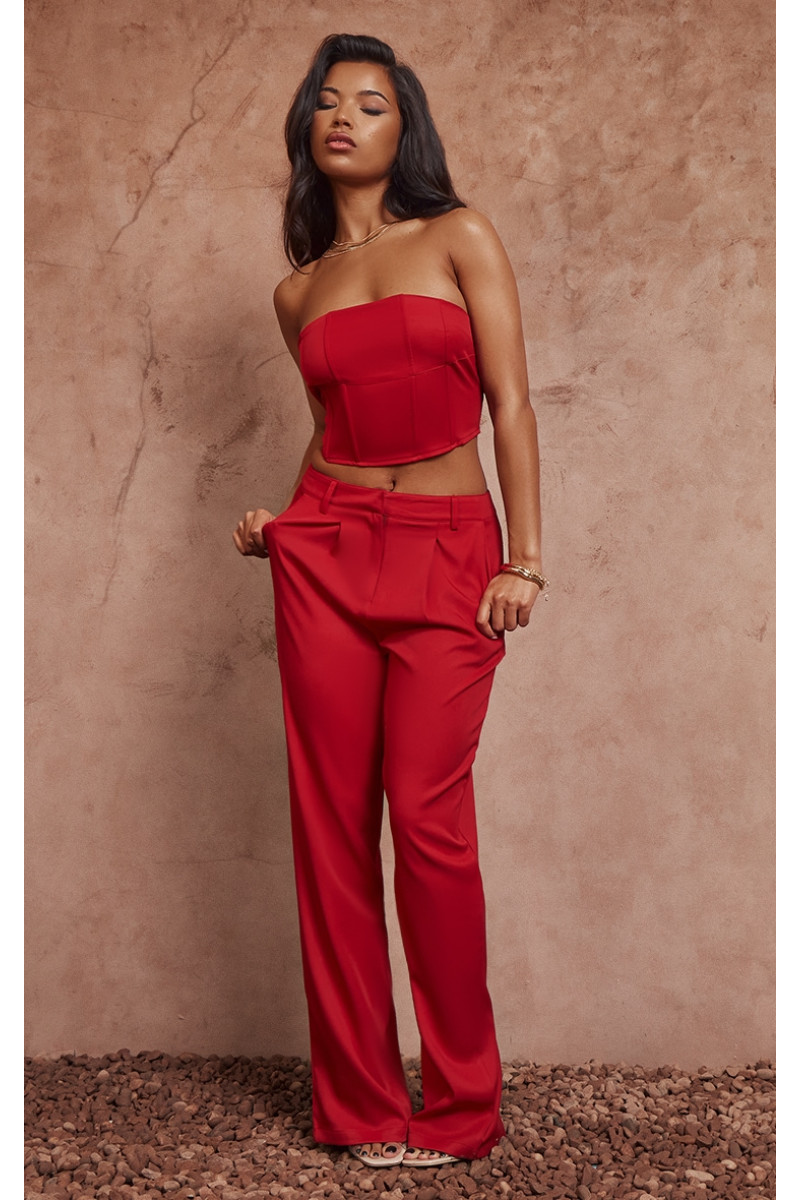 Червоні ткані штани