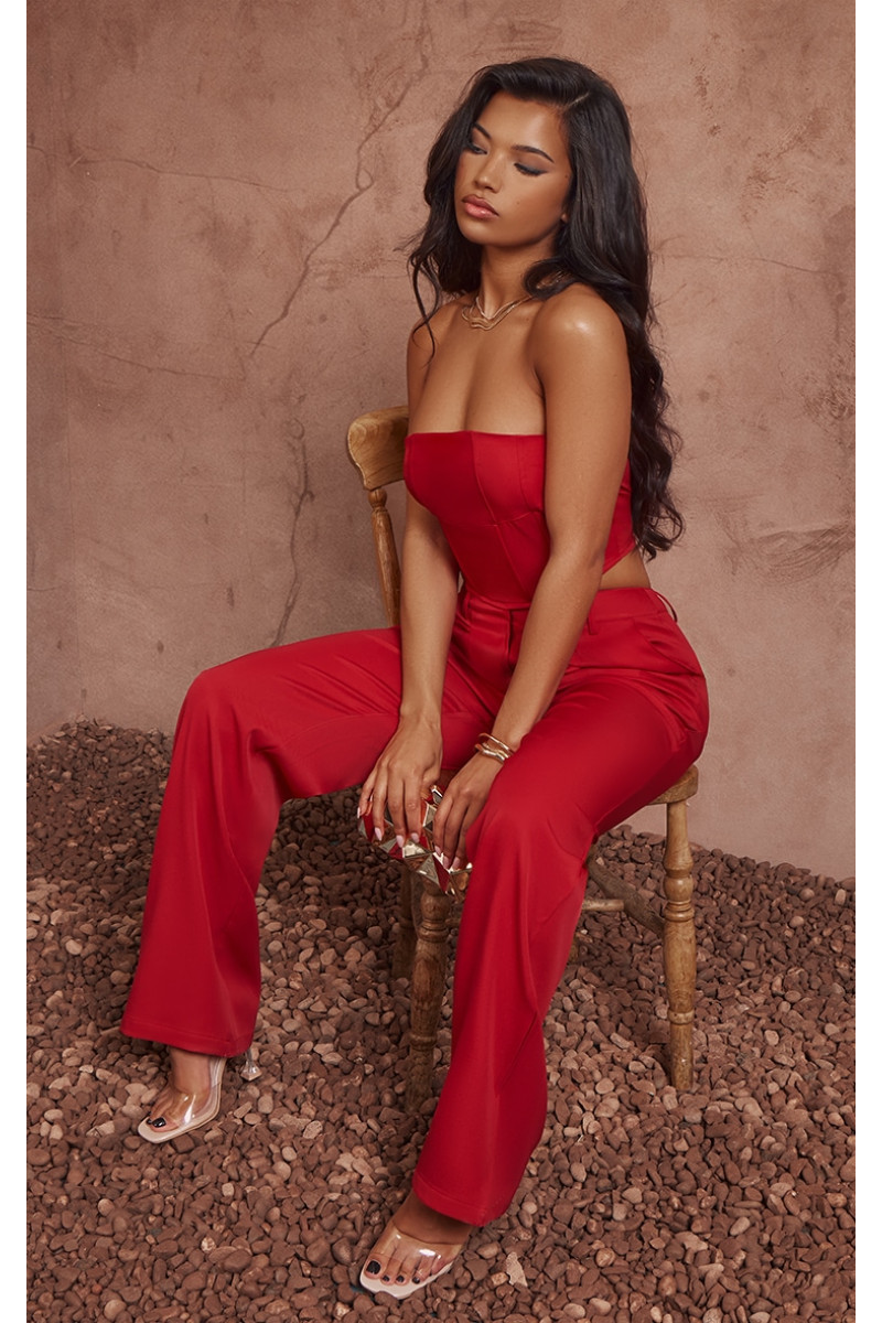 Червоні ткані штани