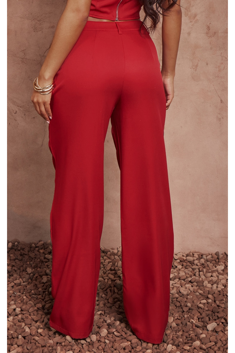 Червоні ткані штани