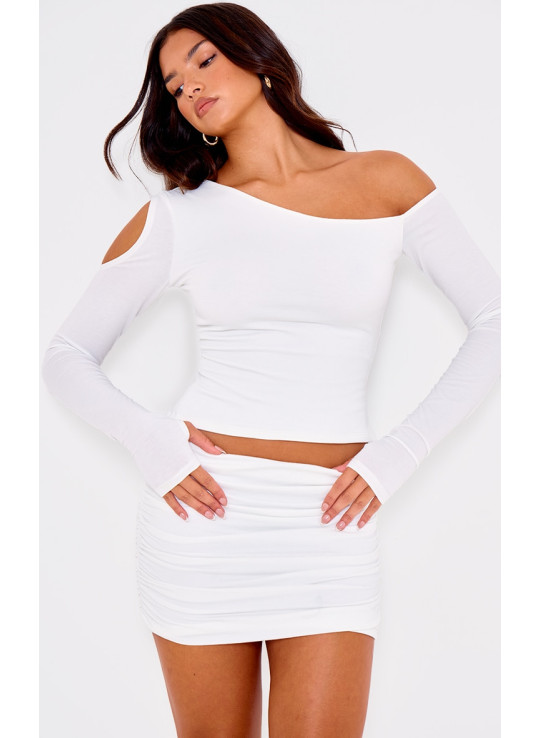 Асиметричний топ з довгими рукавами з кремового контуру